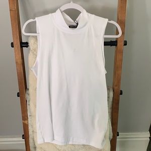 White turtle neck with no sleeves **NEVER WORN**